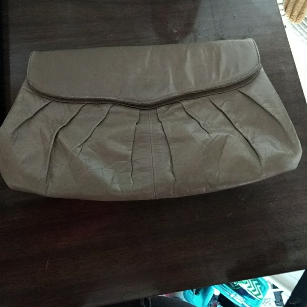 Creme / tan colored faux leather  clutch